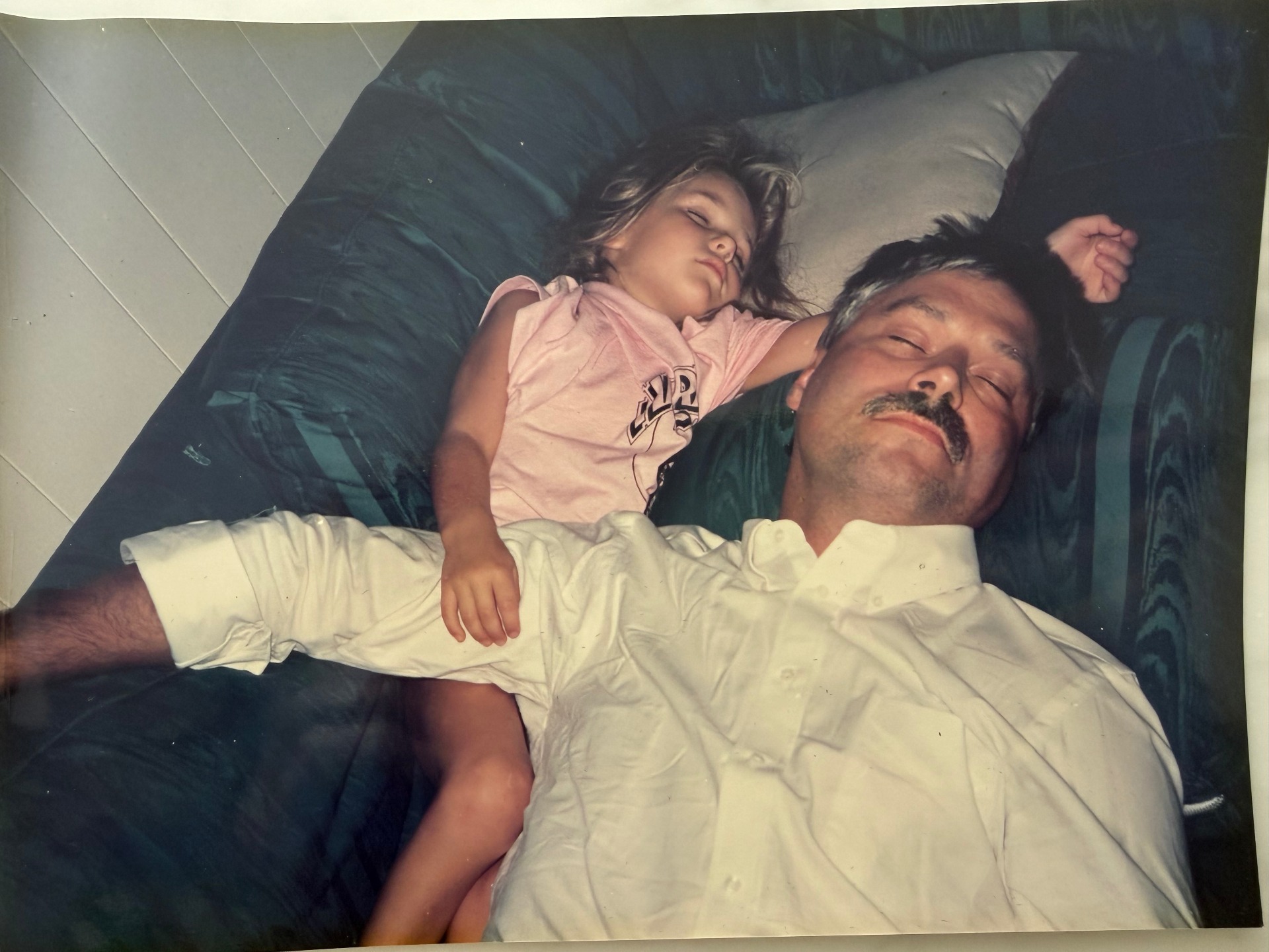 The artist as a small child asleep beside her father